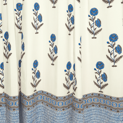 Jaipuri cotton curtain showcasing blue printed border and floral motifs

